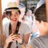Smiling woman wearing a hat