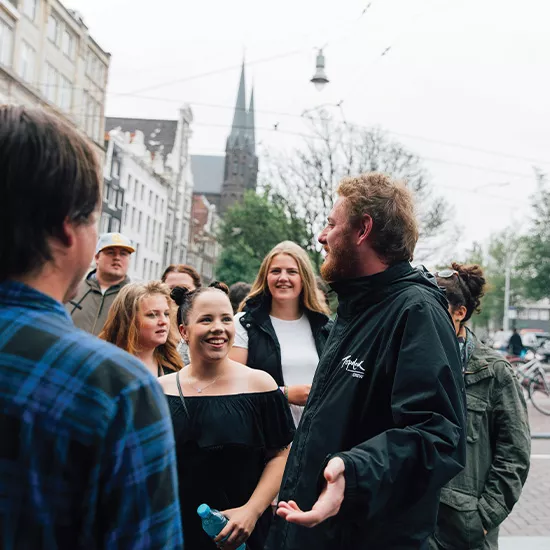 A Topdeck Trip Leader describing the sights of the iconic European city of Amsterdam.